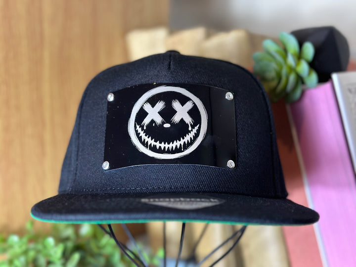 Smiley Metal Plate Snapback Hat