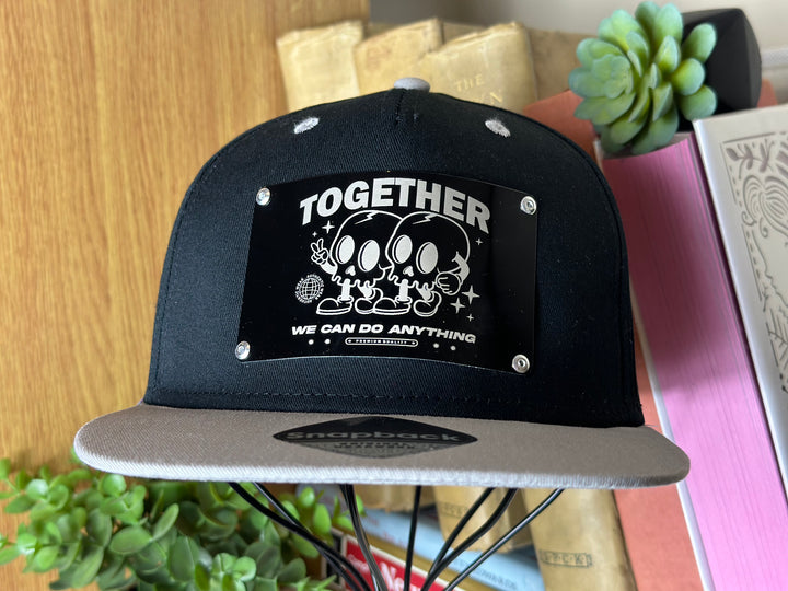 Togetherness Metal Plate Snapback Hat